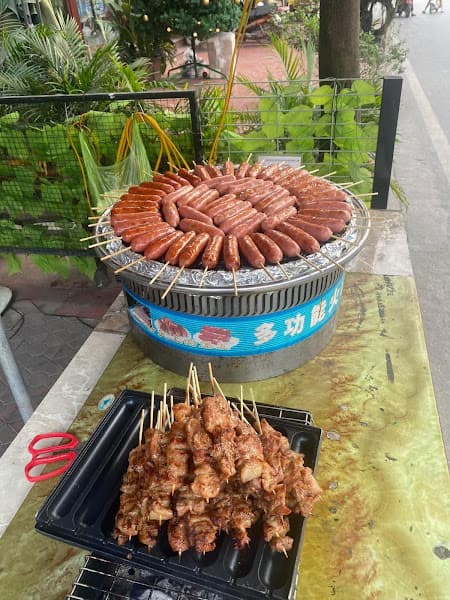 Hình ảnh Quán cô Liên (bánh mì muối ớt, lạp xưởng nướng đá, bánh giò, đồ ăn vặt,...) - 2